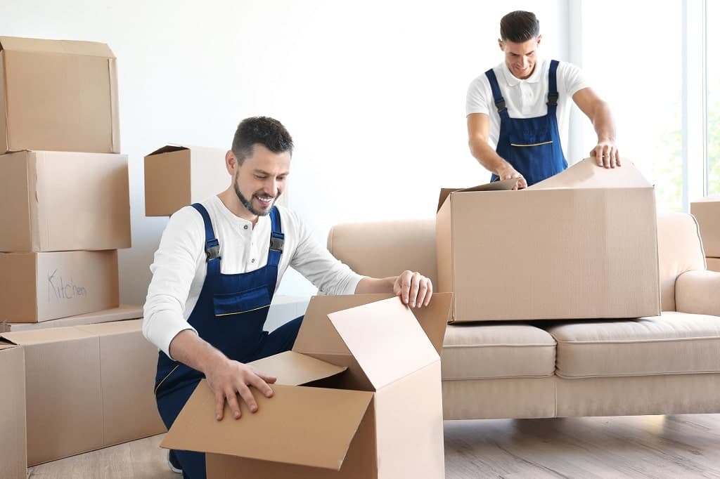 Movers unloading a truck for a short-notice move