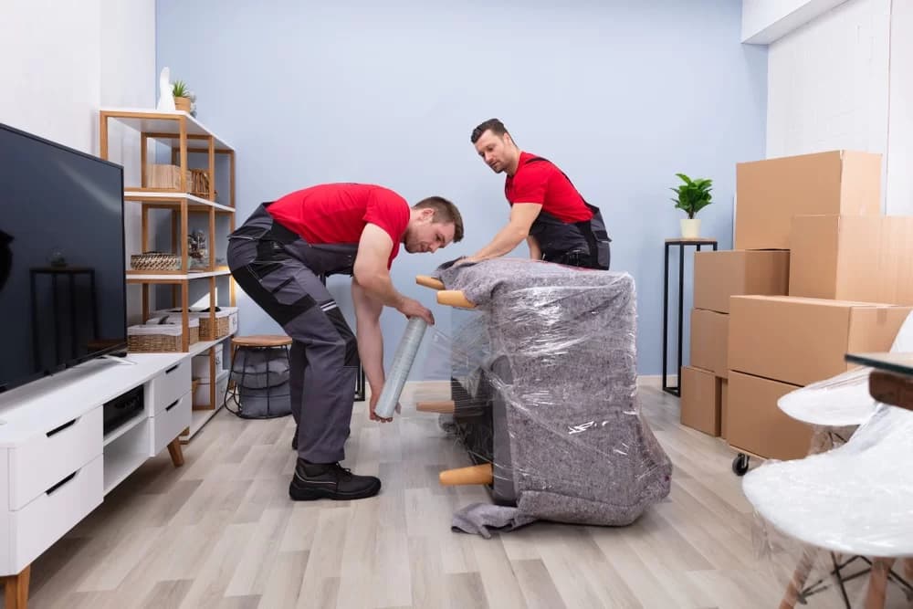 Family arriving at a new home after a long-distance relocation
