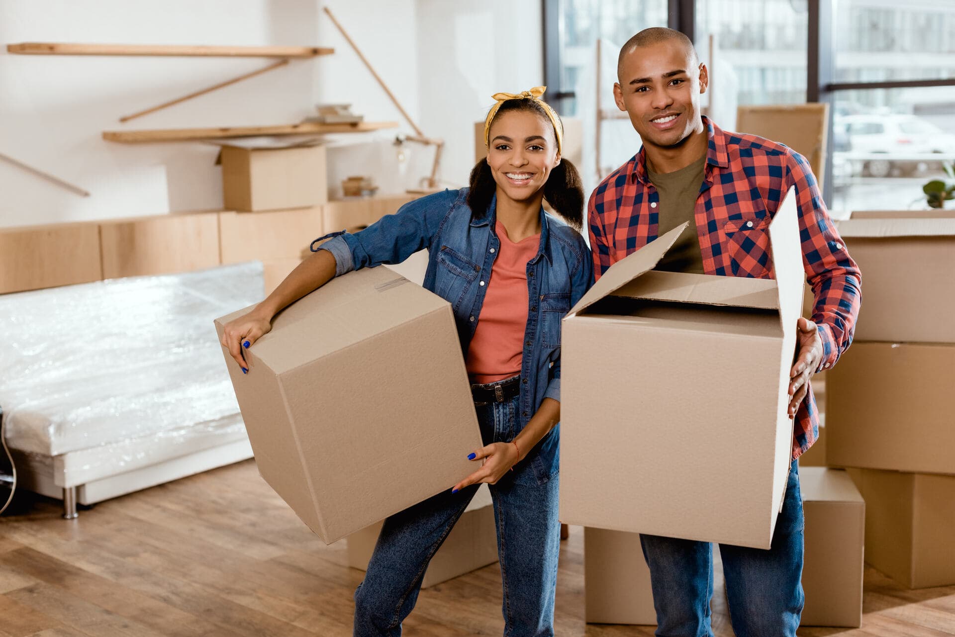 A couple preparing for the packing process before a move