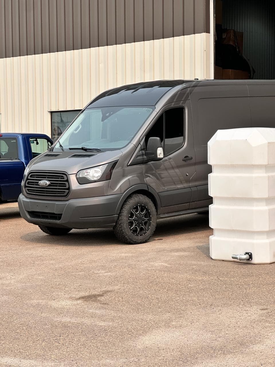 Compass Cartage moving truck and uniformed relocation team