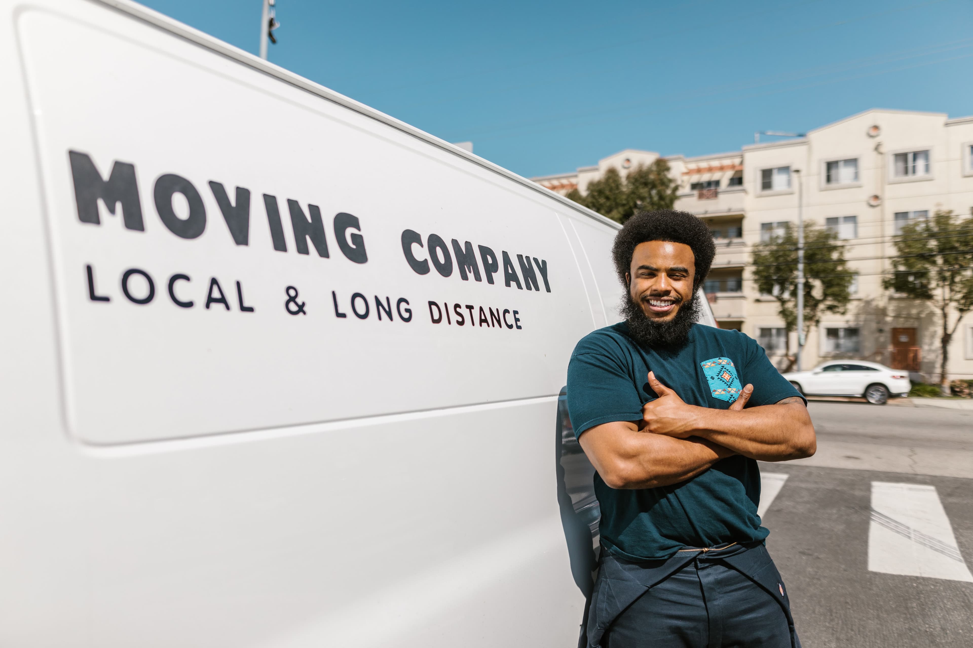 Two professional movers coordinating a move indoors